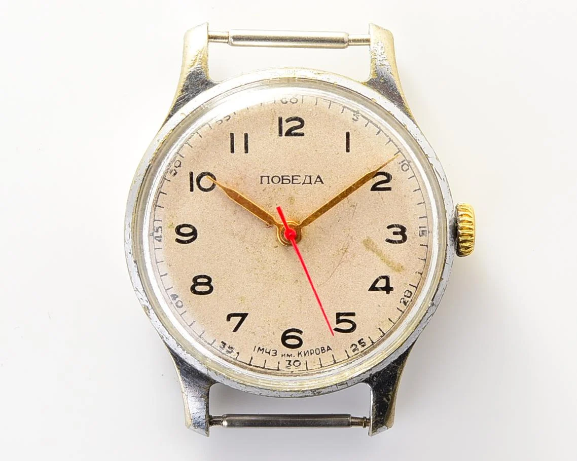 Vintage Soviet mechanical Pobeda wrist watch with central seconds hand