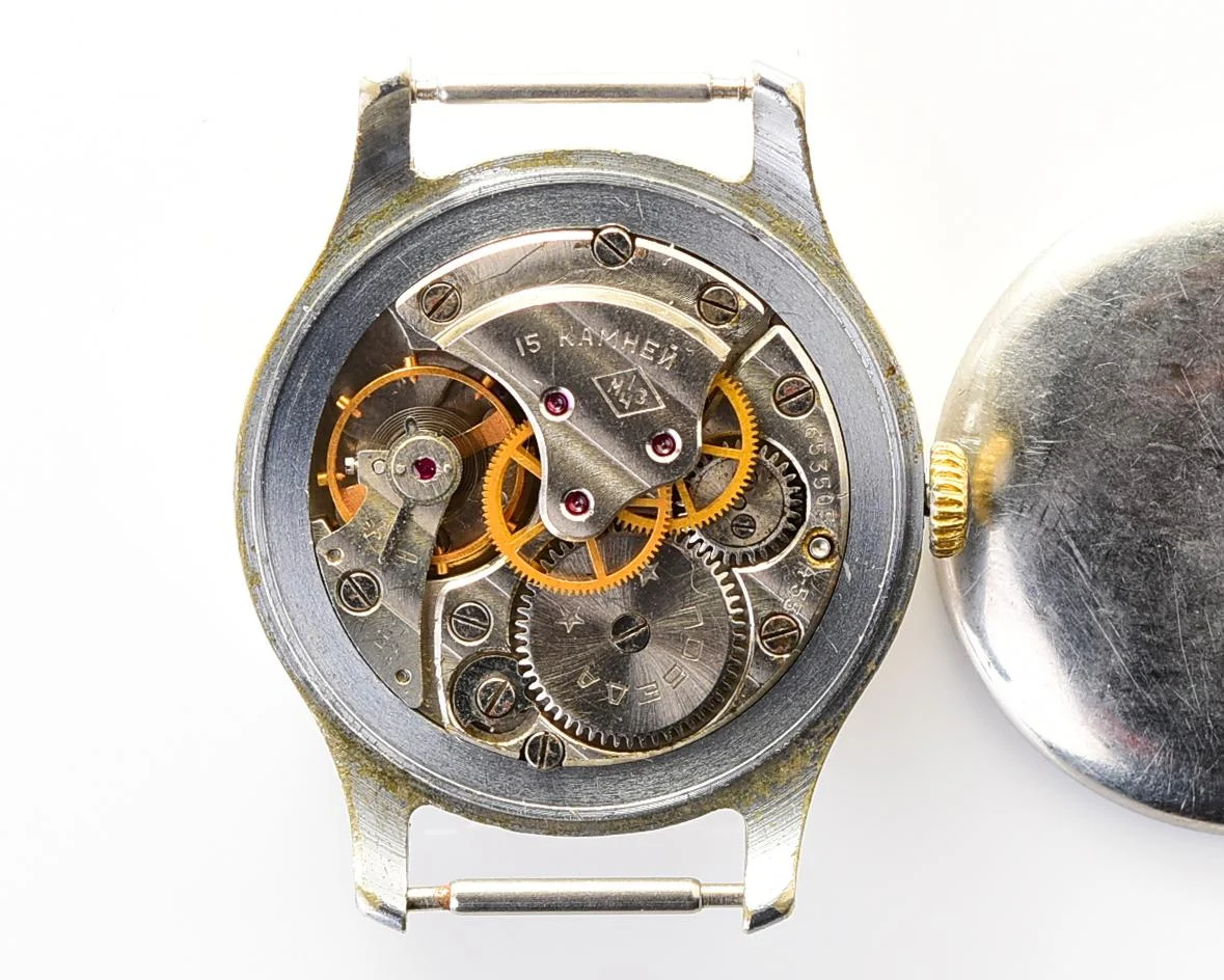 Vintage Soviet mechanical Pobeda wrist watch with central seconds hand