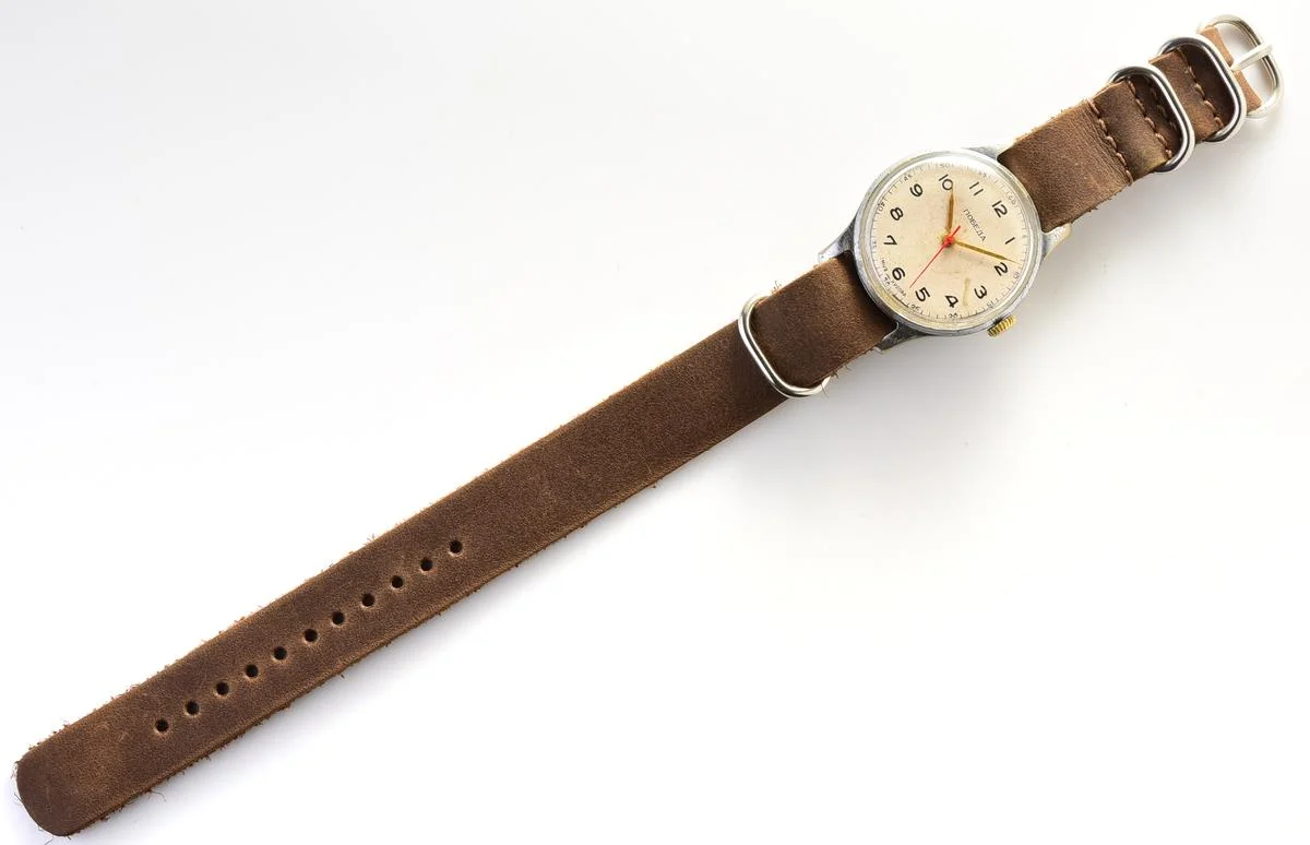 Vintage Soviet mechanical Pobeda wrist watch with central seconds hand