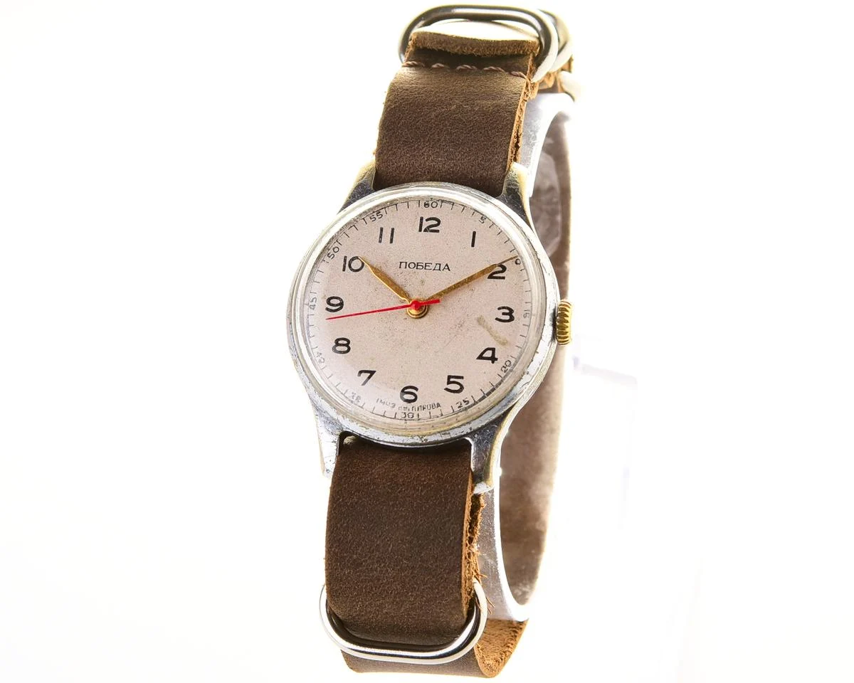Vintage Soviet mechanical Pobeda wrist watch with central seconds hand