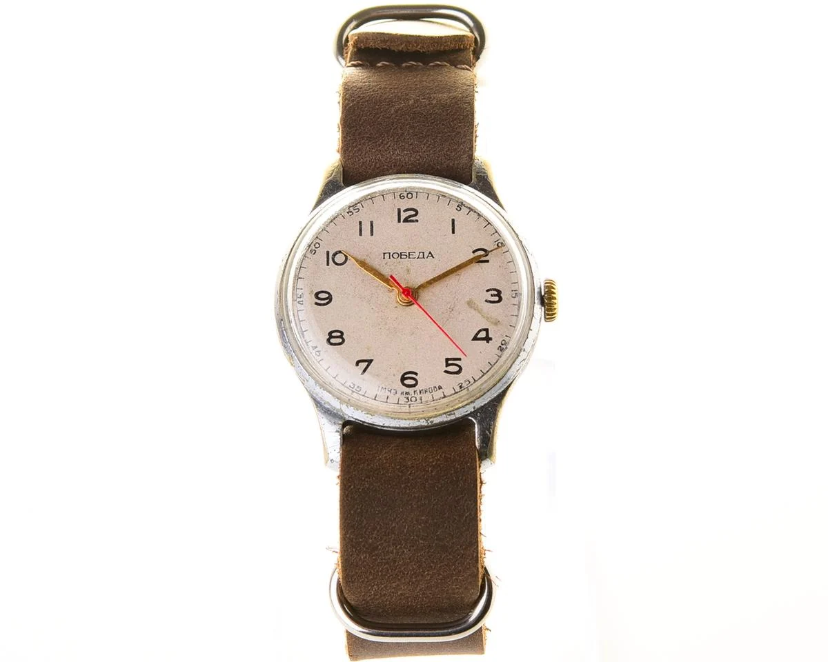 Vintage Soviet mechanical Pobeda wrist watch with central seconds hand