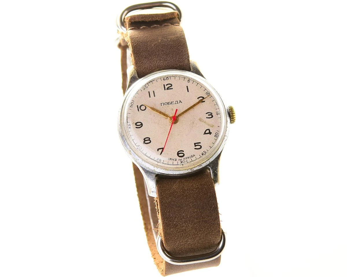 Vintage Soviet mechanical Pobeda wrist watch with central seconds hand