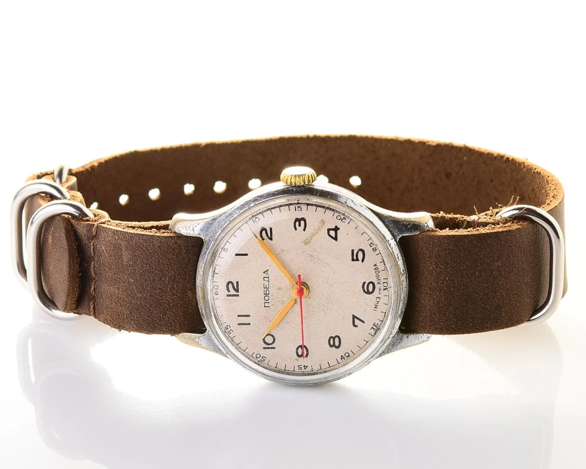 Vintage Soviet mechanical Pobeda wrist watch with central seconds hand