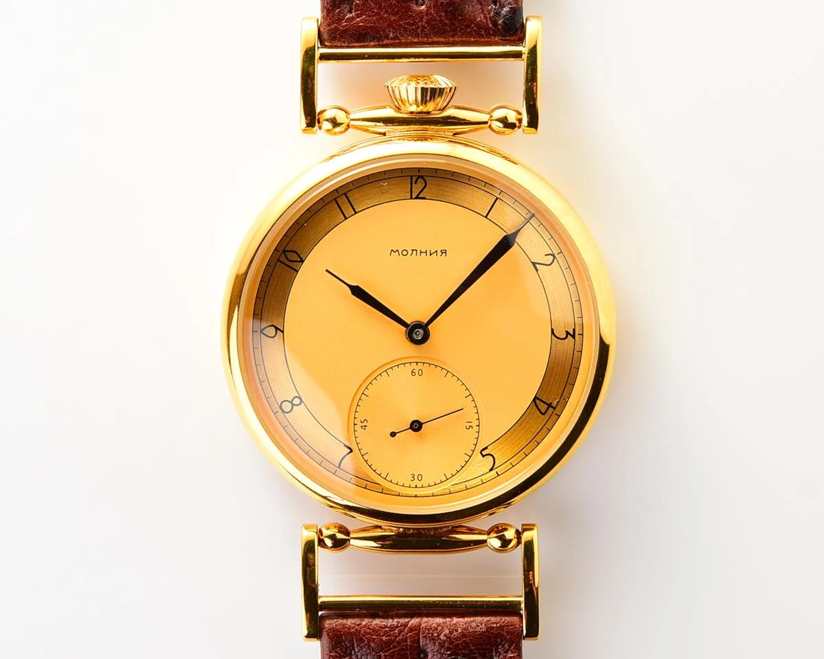 Soviet style Molnija wrist watch with luxury ostrich leather strap and transparent back cover!