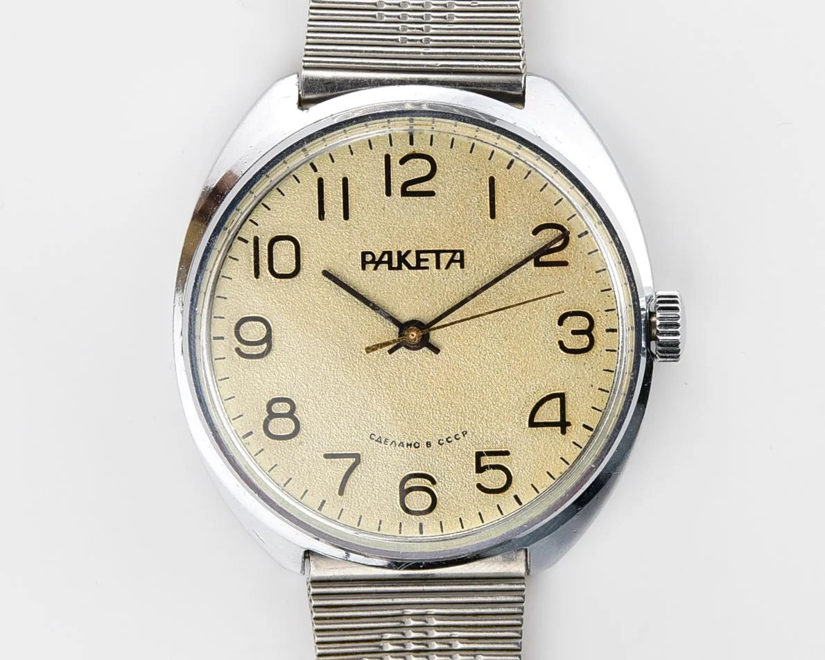 Vintage Raketa mechanical watch with Raketa branded stainless steel bracelet