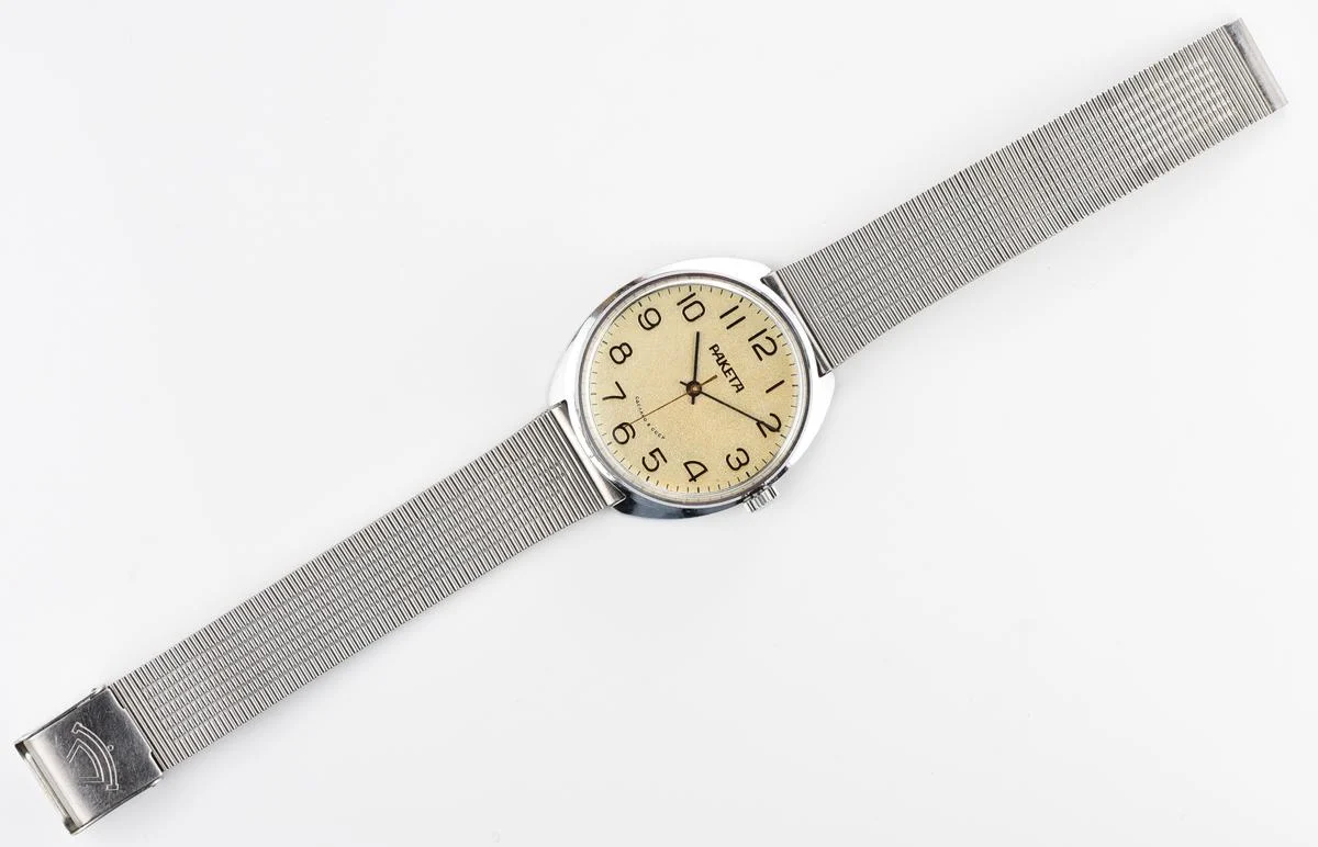 Vintage Raketa mechanical watch with Raketa branded stainless steel bracelet