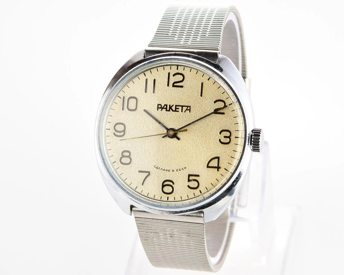 Vintage Raketa mechanical watch with Raketa branded stainless steel bracelet