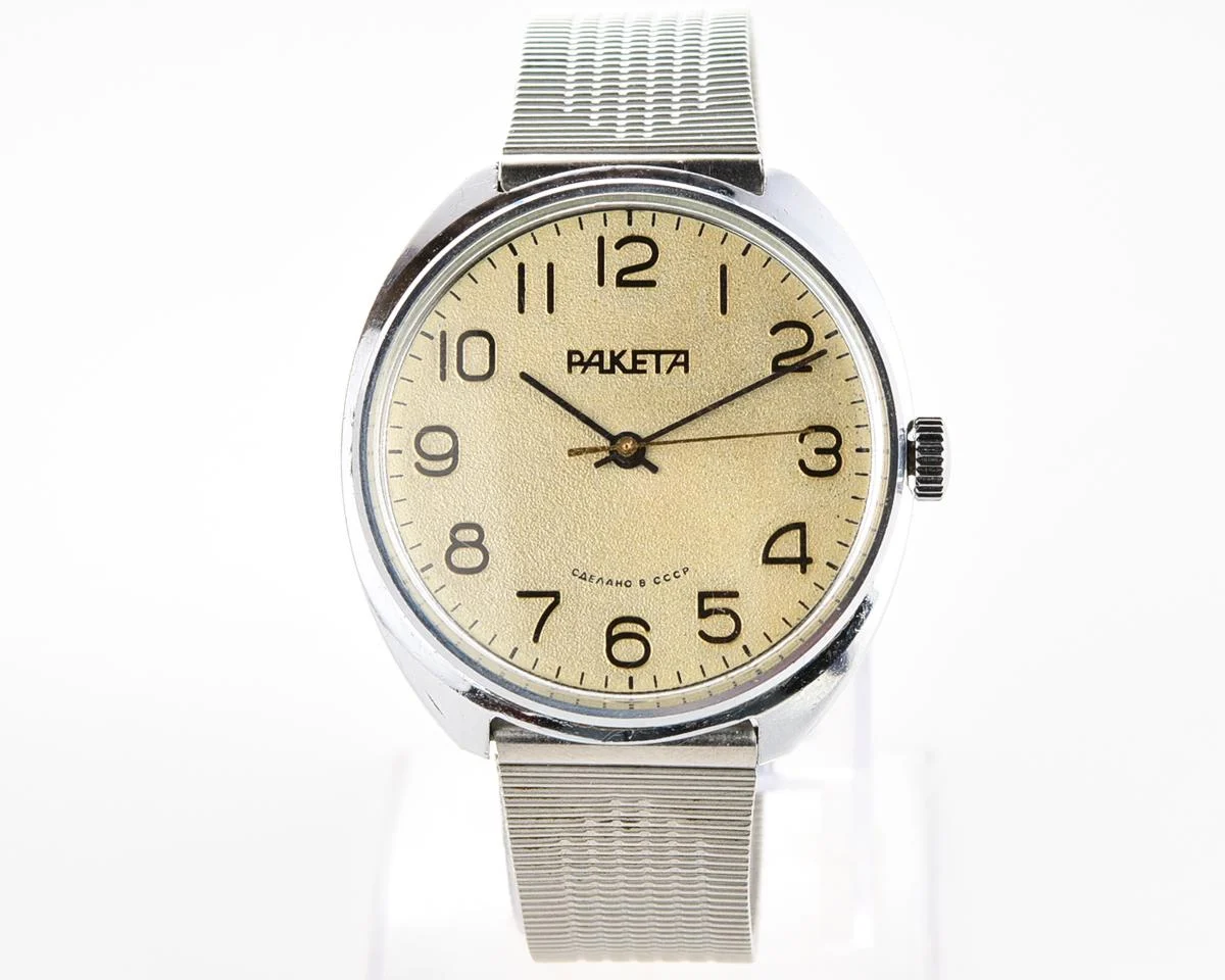 Vintage Raketa mechanical watch with Raketa branded stainless steel bracelet