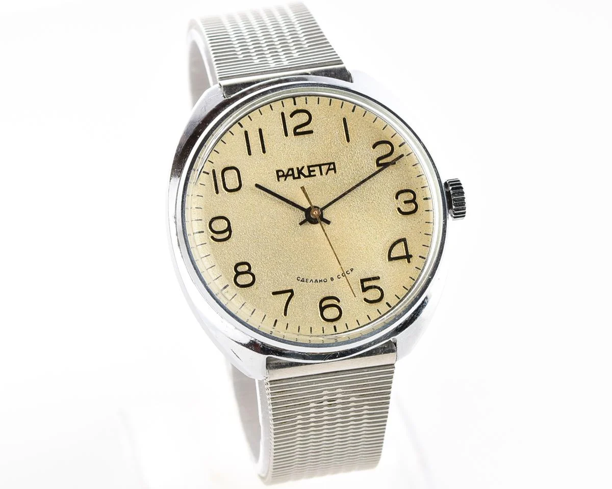 Vintage Raketa mechanical watch with Raketa branded stainless steel bracelet