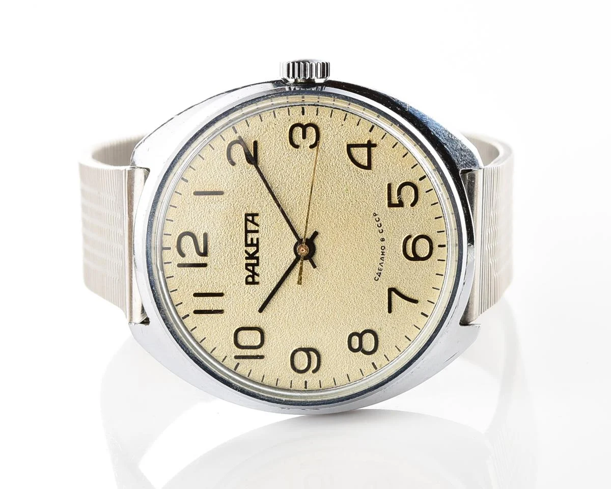Vintage Raketa mechanical watch with Raketa branded stainless steel bracelet