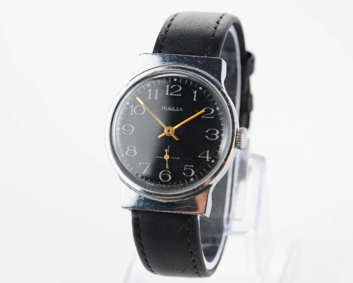 Soviet mechanical POBEDA watch with textured black dial