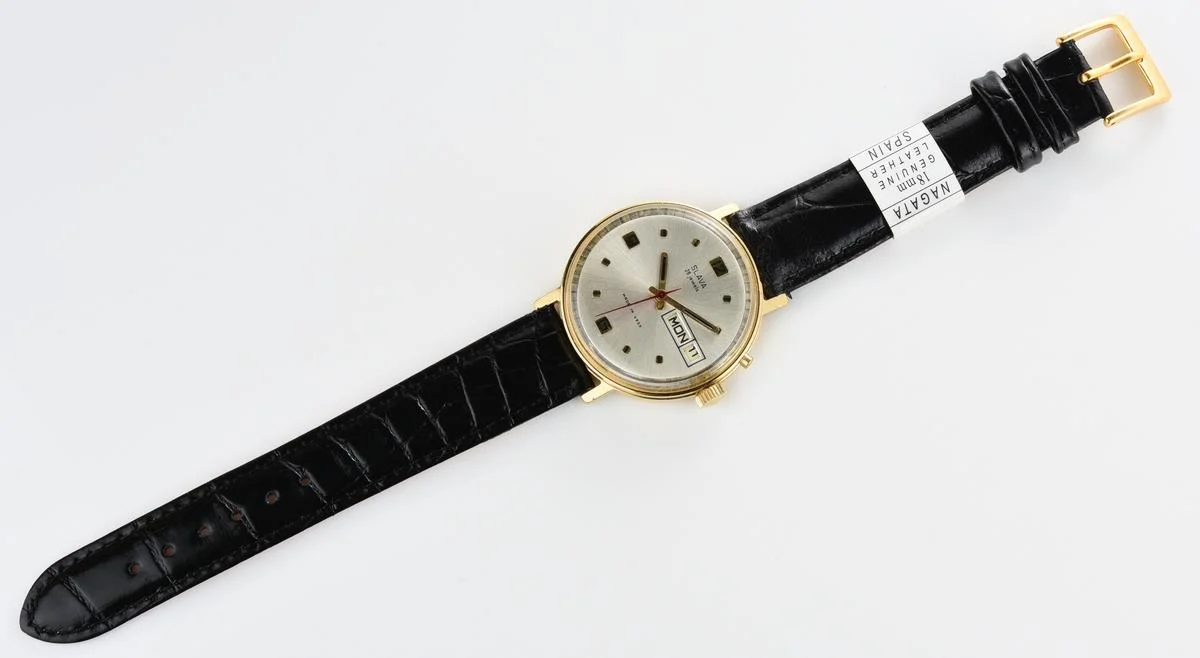 Slava gold-plated vintage Soviet mechanical watch with day/date calendar