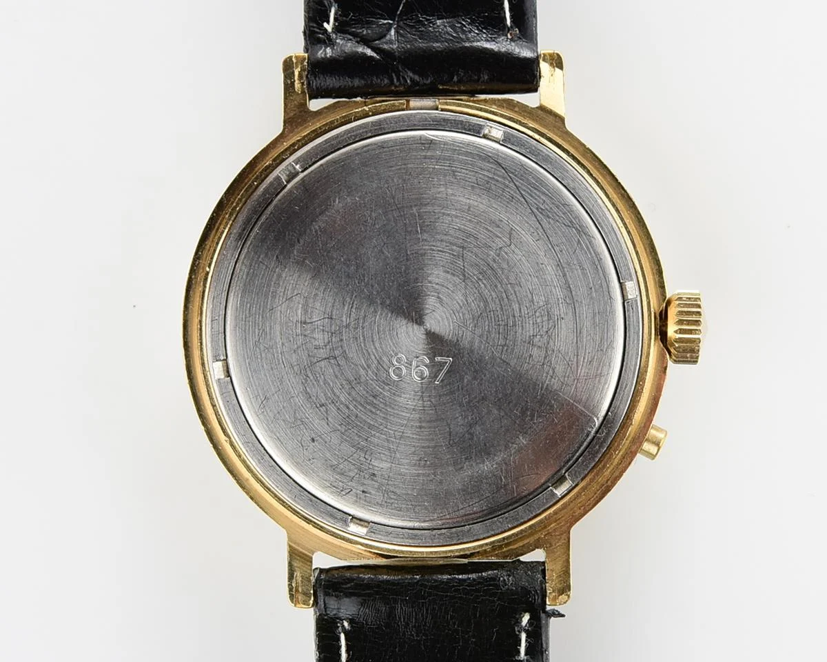 Slava gold-plated vintage Soviet mechanical watch with day/date calendar