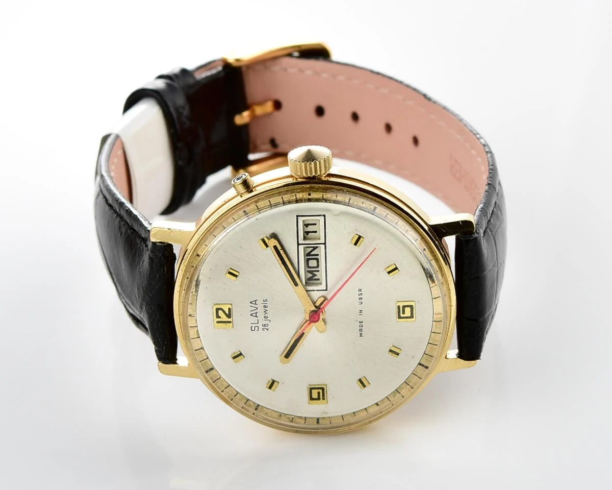 Slava gold-plated vintage Soviet mechanical watch with day/date calendar