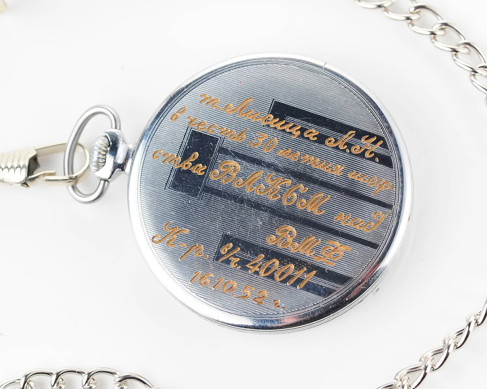 Soviet open face Molnija vintage pocket watch from 1951 with cool engraving