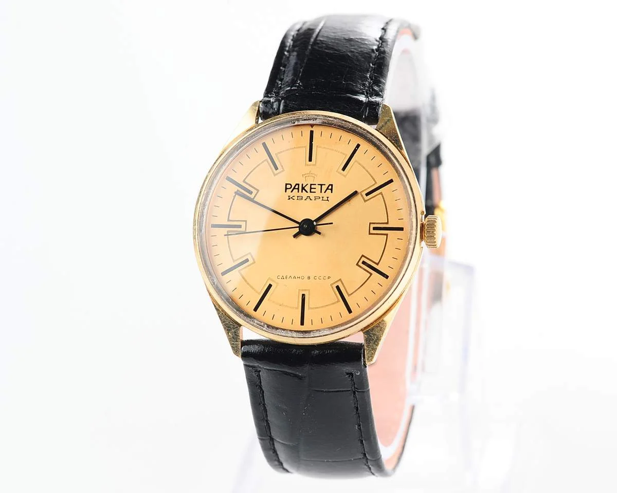 Elegant Raketa Soviet quartz watch with engraved back