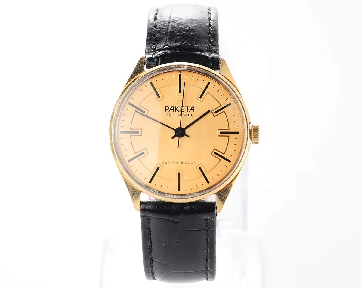 Elegant Raketa Soviet quartz watch with engraved back