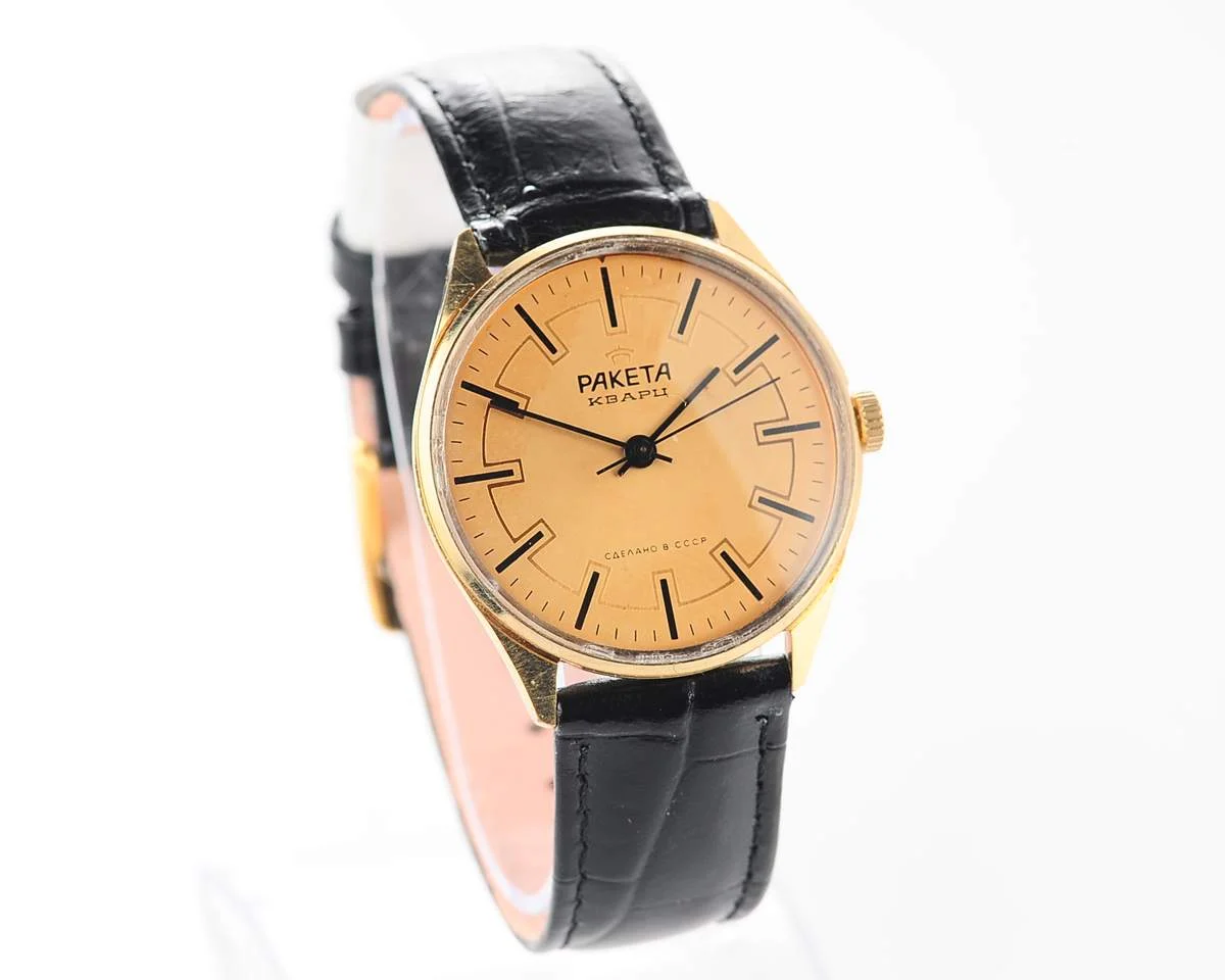 Elegant Raketa Soviet quartz watch with engraved back