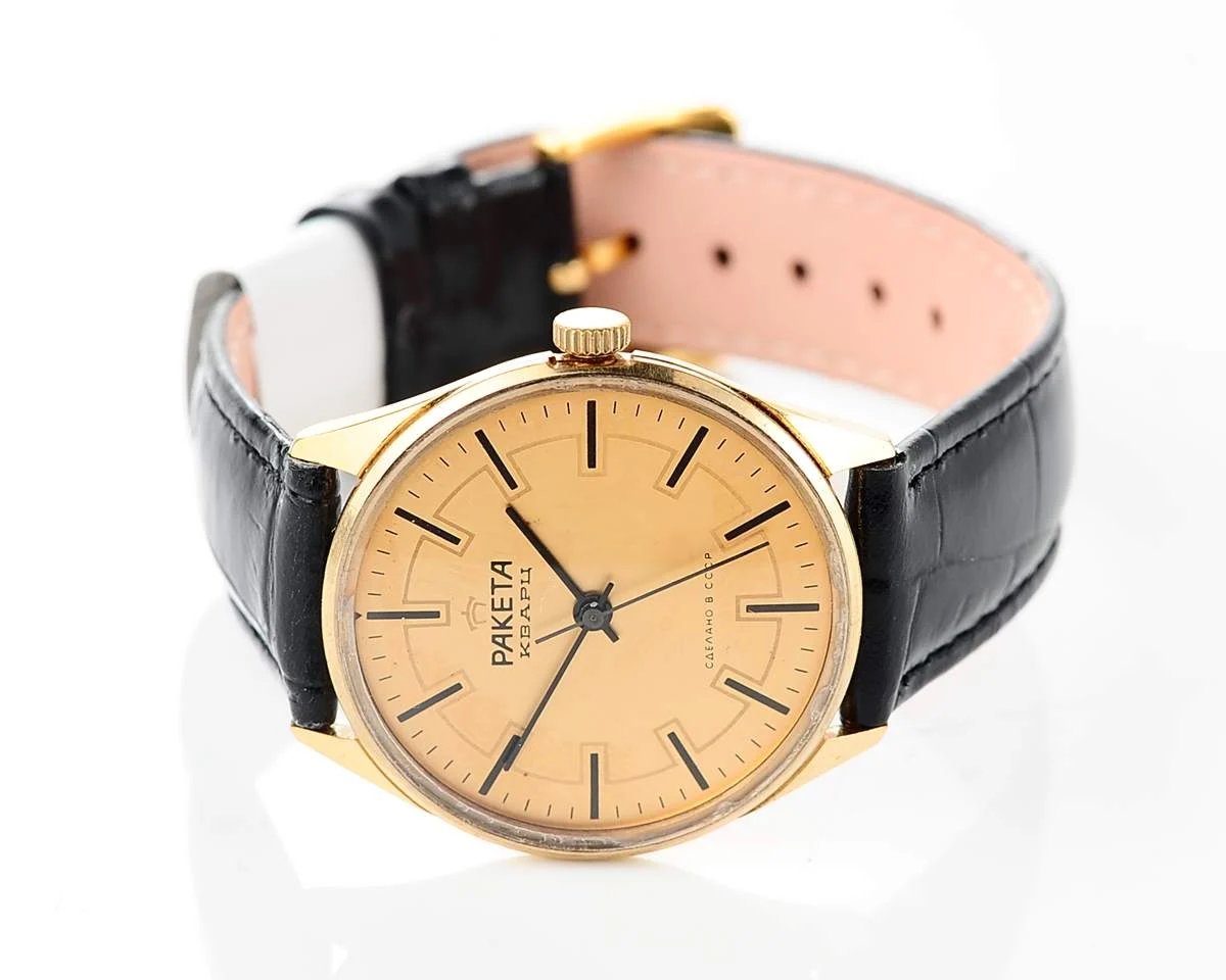 Elegant Raketa Soviet quartz watch with engraved back