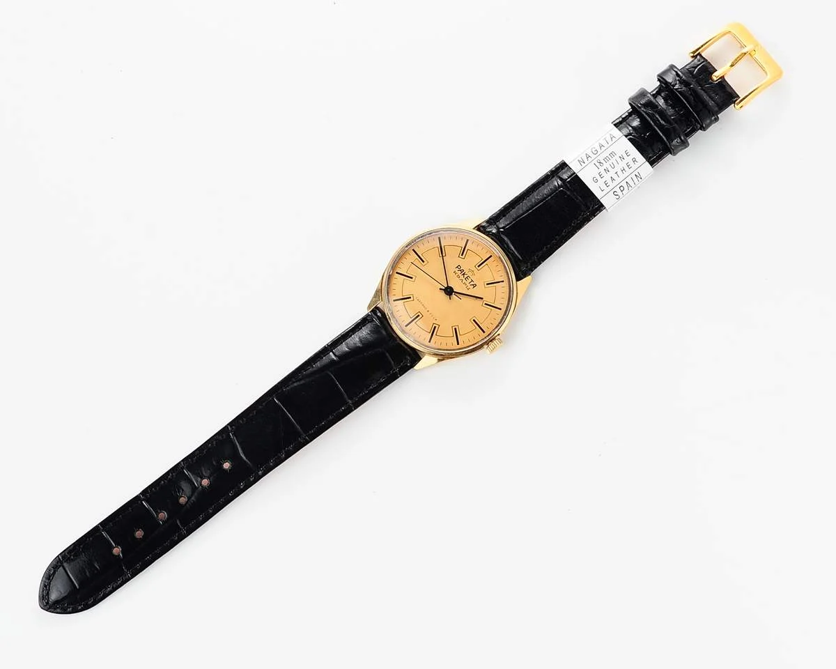 Elegant Raketa Soviet quartz watch with engraved back