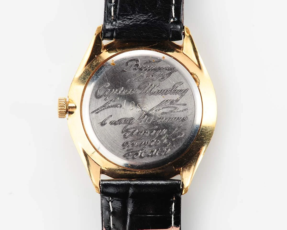 Elegant Raketa Soviet quartz watch with engraved back