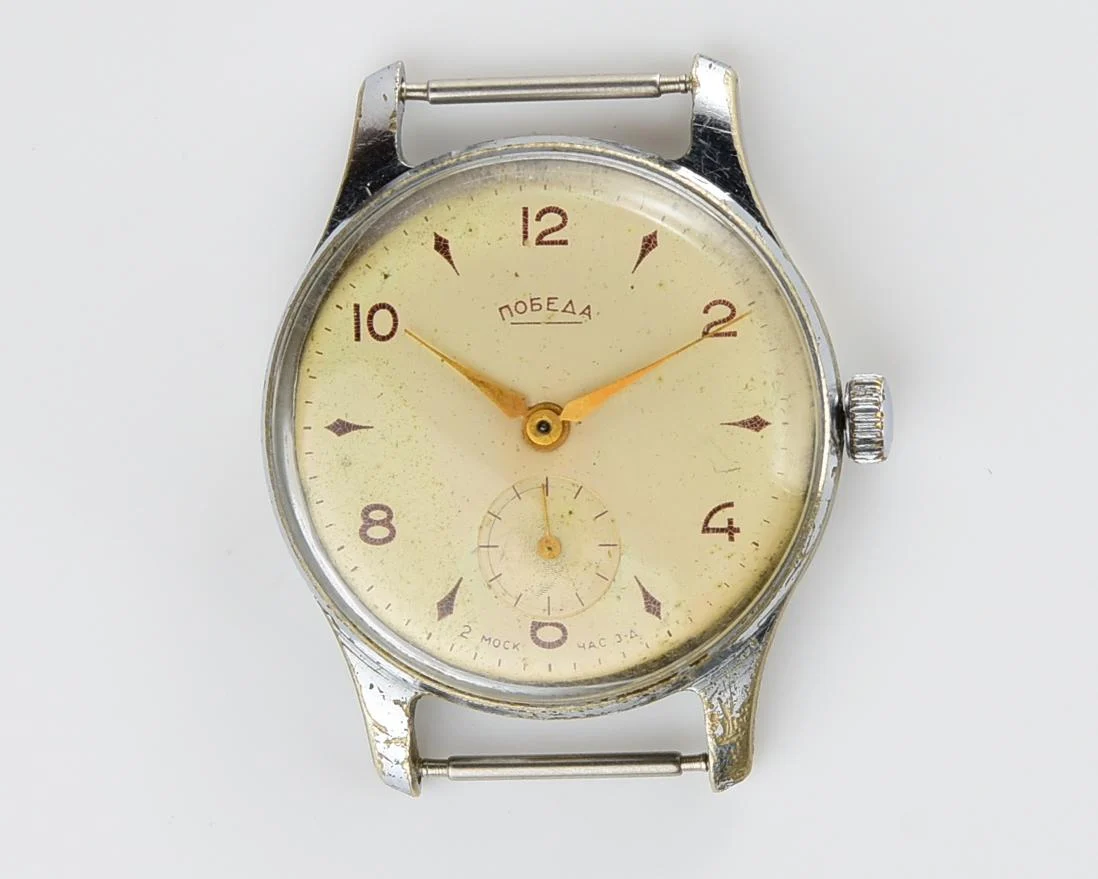 Vintage Soviet mechanical Pobeda wrist watch, 4th quarter 1957