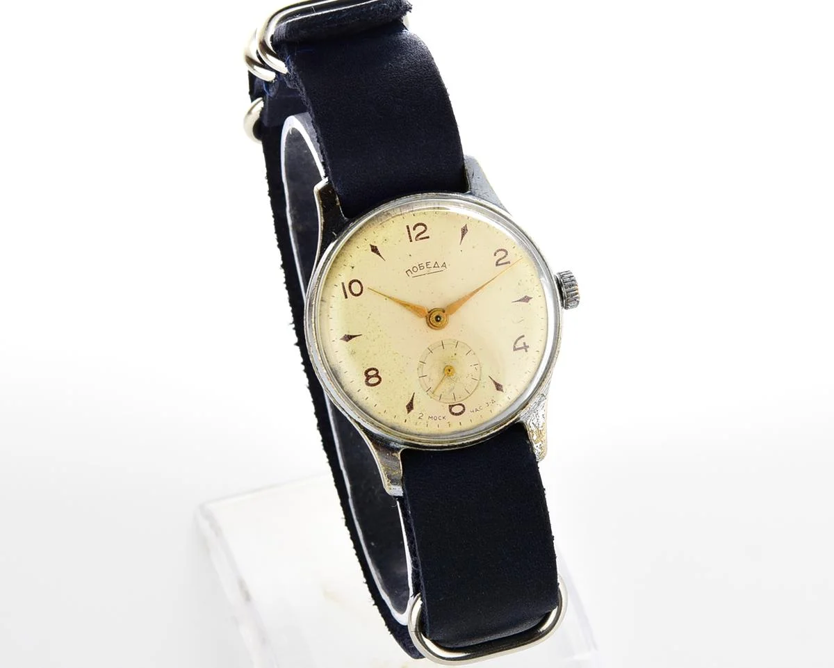 Vintage Soviet mechanical Pobeda wrist watch, 4th quarter 1957