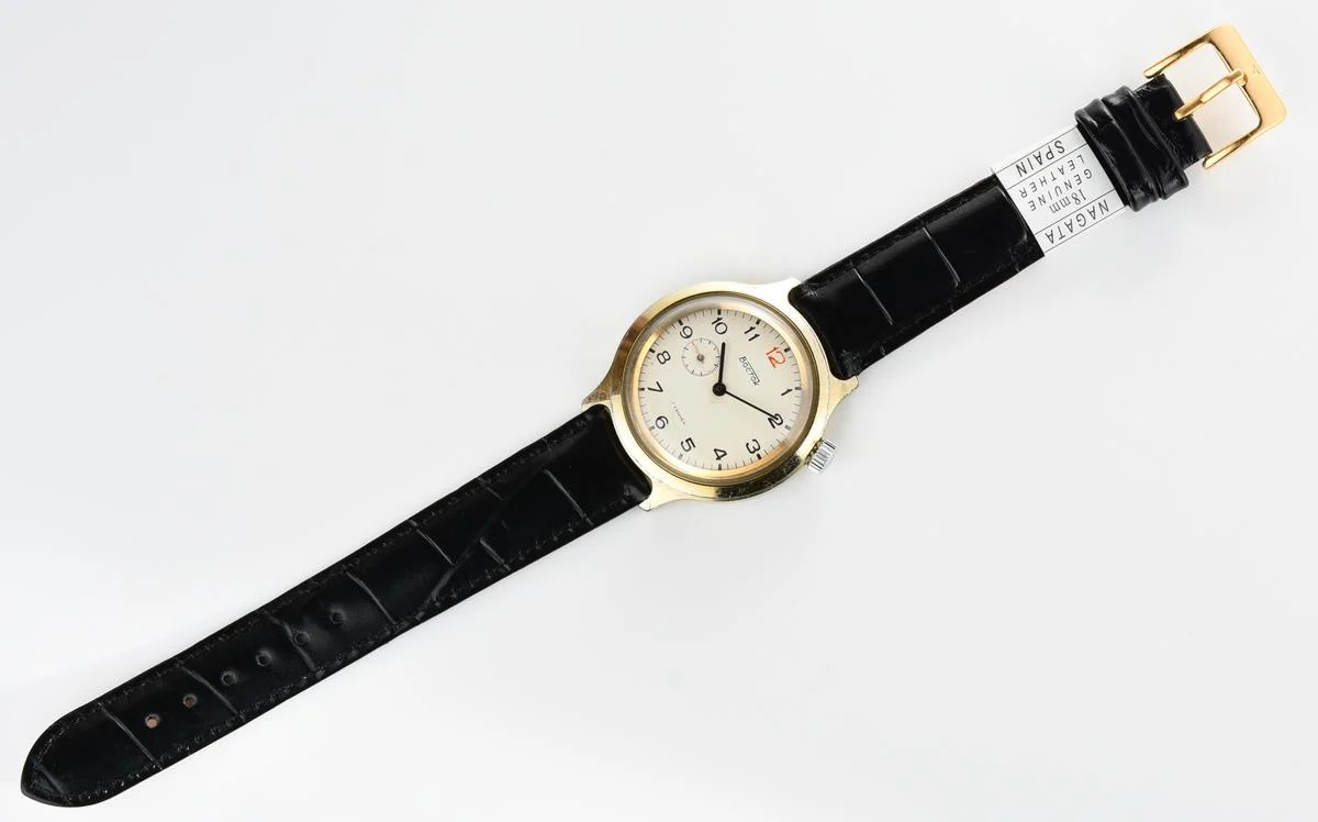 Vintage Soviet Vostok mechanical watch with winding crown on 2 o'clock