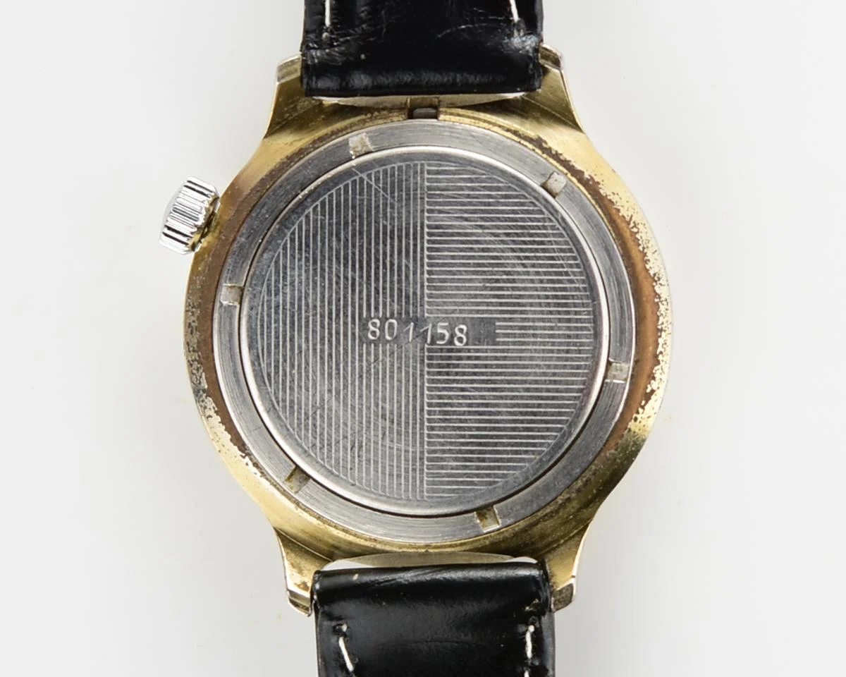 Vintage Soviet Vostok mechanical watch with winding crown on 2 o'clock