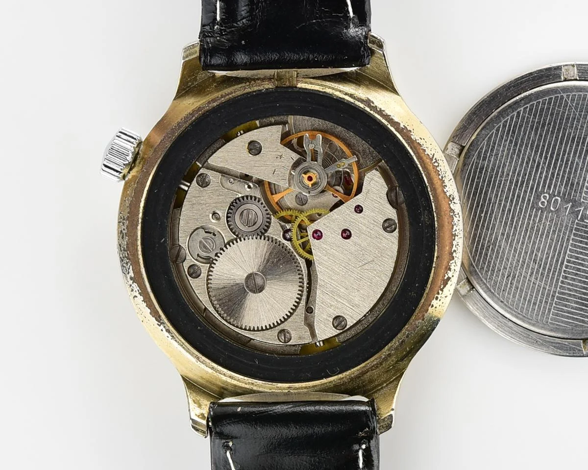 Vintage Soviet Vostok mechanical watch with winding crown on 2 o'clock