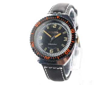 Vintage Soviet Raketa quartz watch with rotating bezel - engraved back!