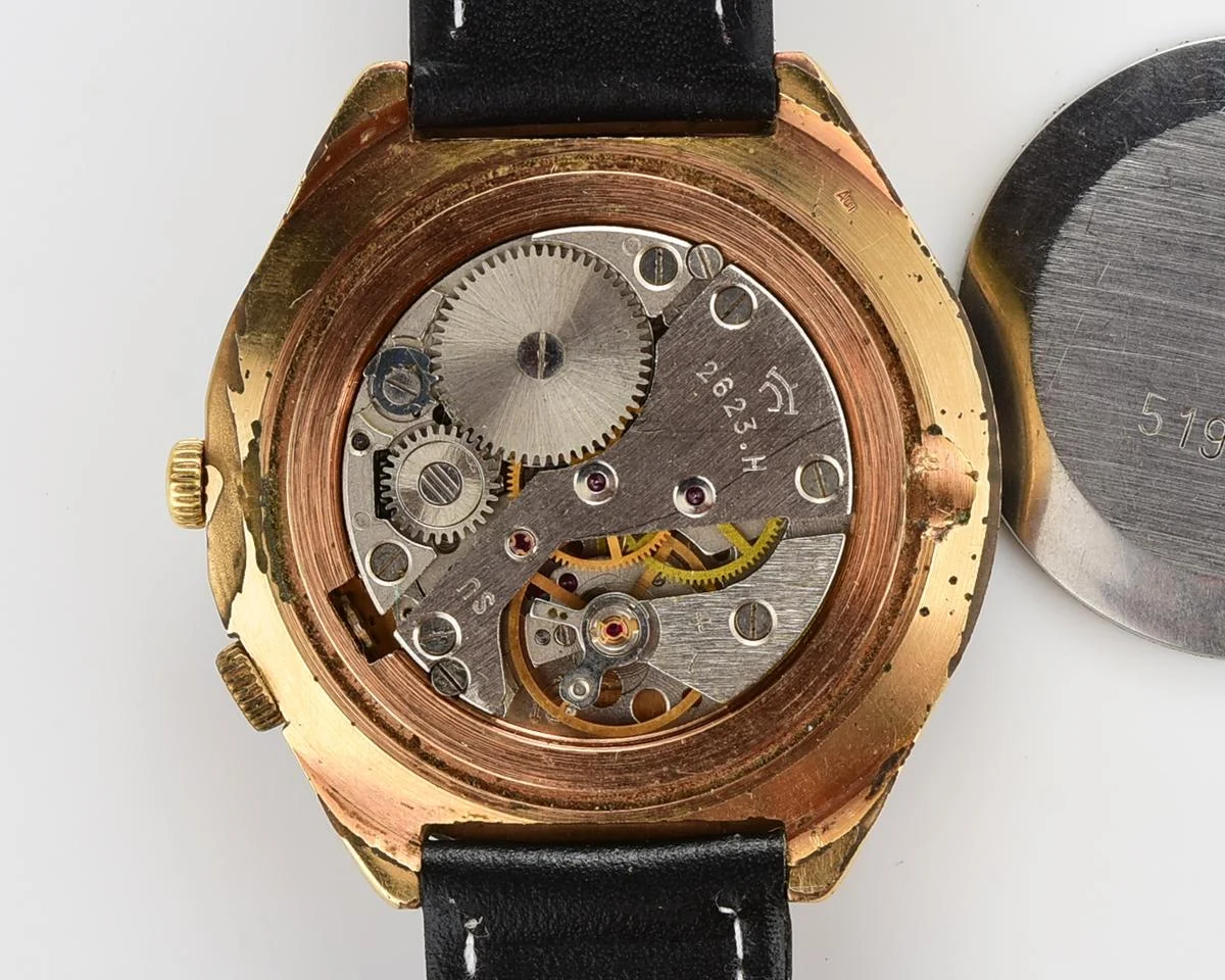 Vintage mechanical gold-plated Raketa watch with 24 hours dial