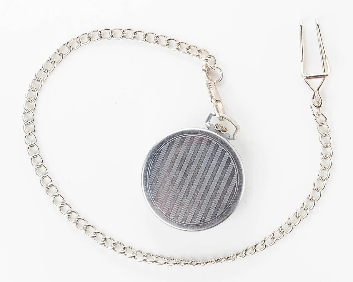 Excellent Molnija open face pocket watch with metallic dial and blue hands