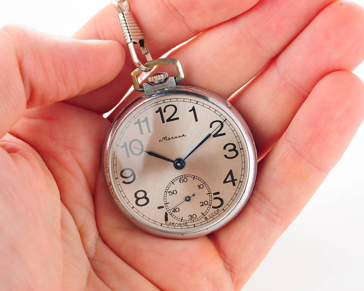 Excellent Molnija open face pocket watch with metallic dial and blue hands