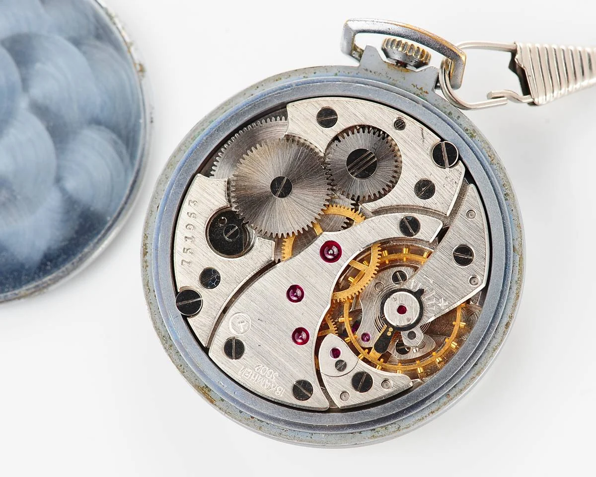 Excellent Molnija open face pocket watch with metallic dial and blue hands
