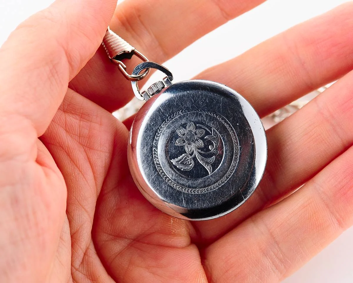 Small Soviet Vostok mechanical pocket watch (can be used as pendant)