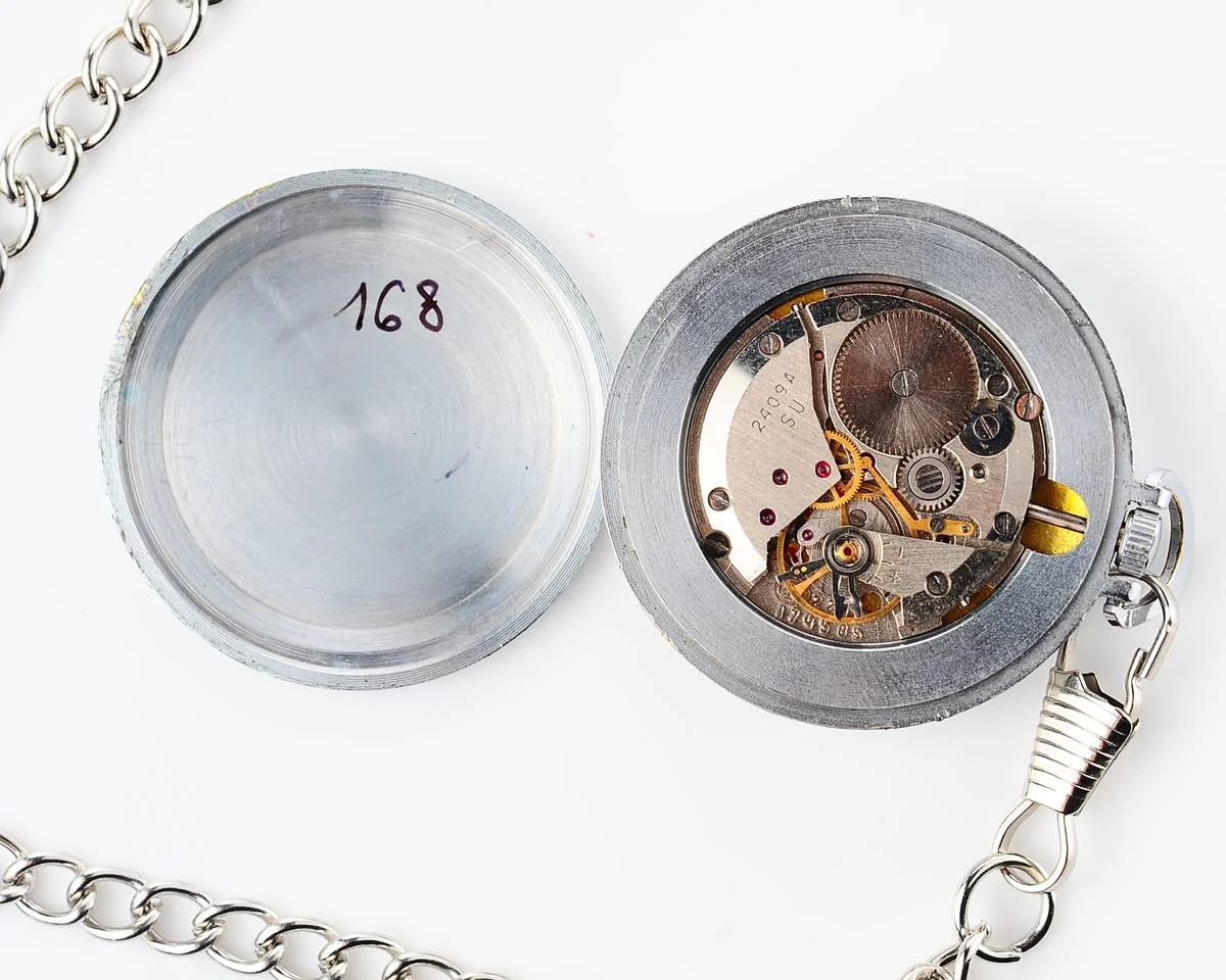 Small Soviet Vostok mechanical pocket watch (can be used as pendant)