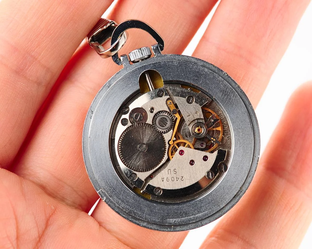 Small Soviet Vostok mechanical pocket watch (can be used as pendant)