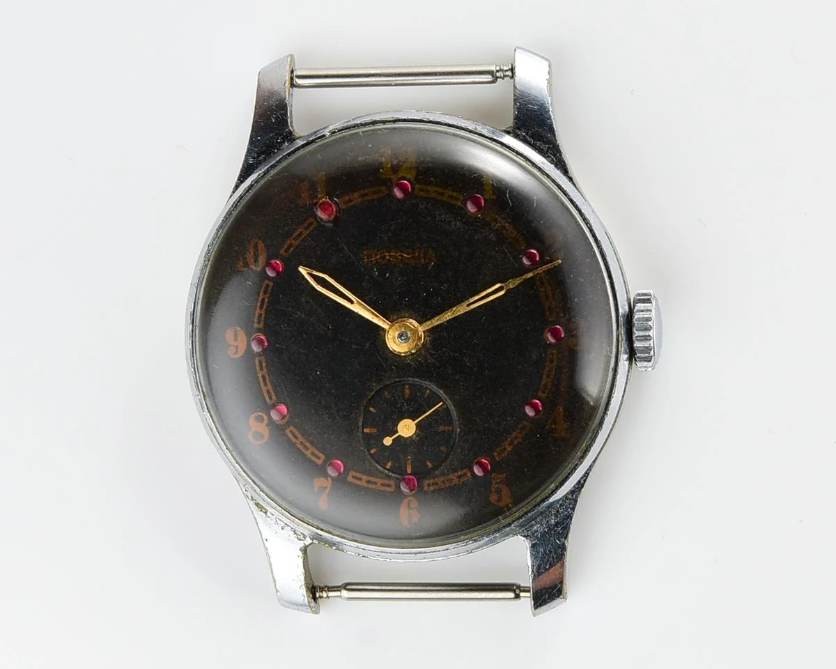 Vintage mechanical Pobeda wrist watch with rubbies on dial