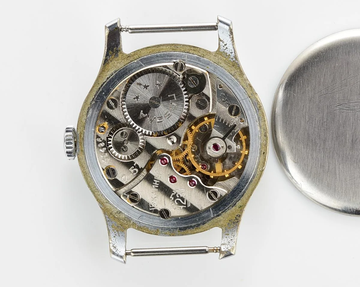 Vintage mechanical Pobeda wrist watch with rubbies on dial