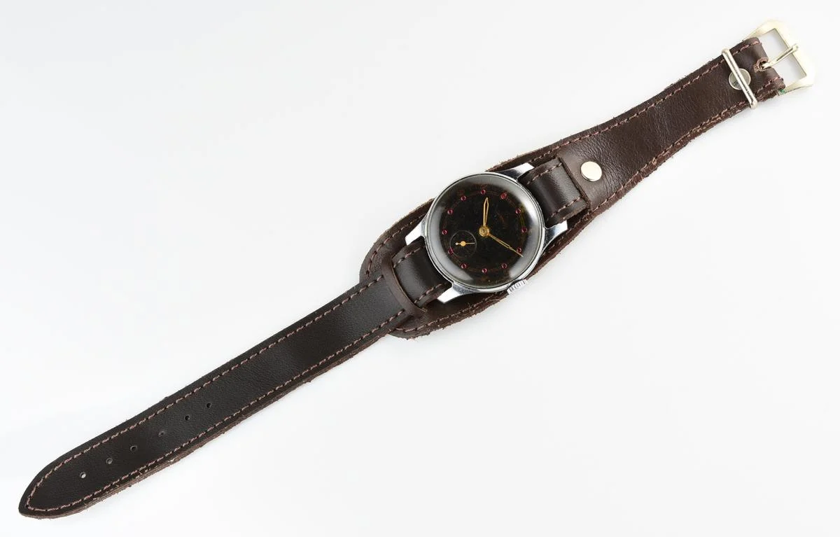 Vintage mechanical Pobeda wrist watch with rubbies on dial
