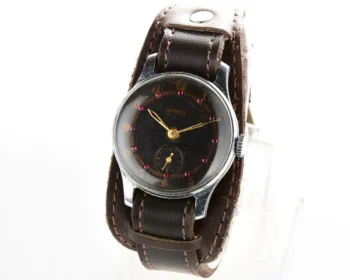 Vintage mechanical Pobeda wrist watch with rubbies on dial