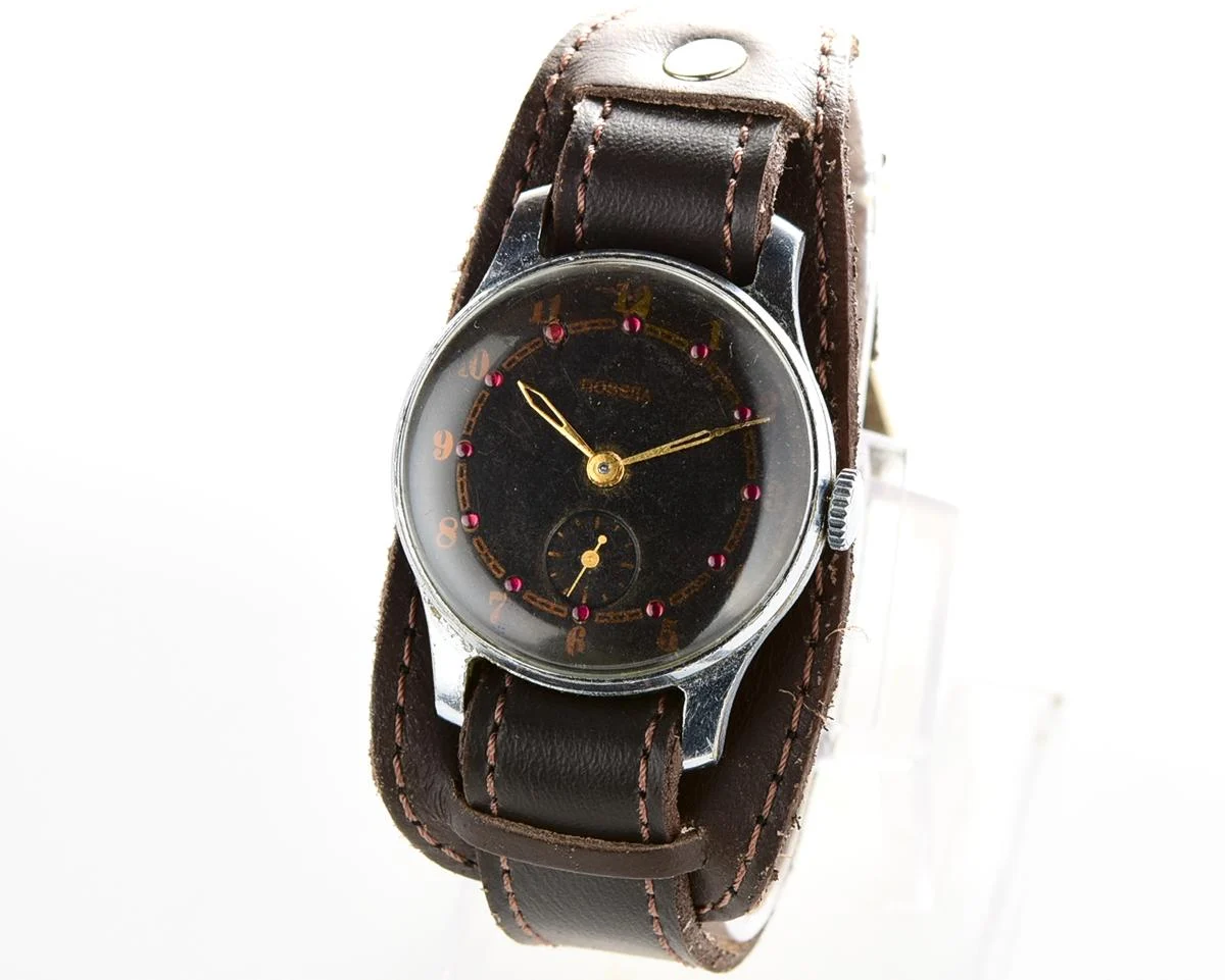 Vintage mechanical Pobeda wrist watch with rubbies on dial