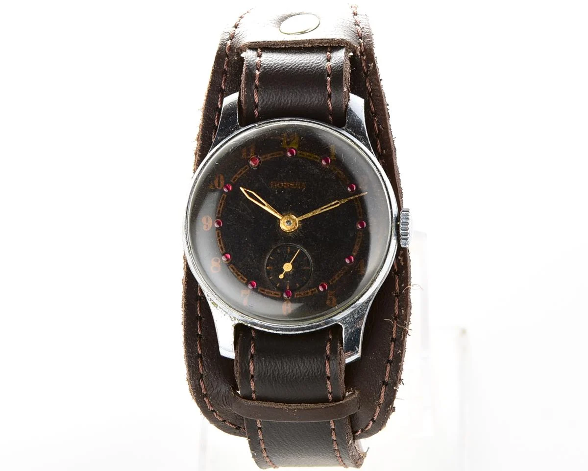 Vintage mechanical Pobeda wrist watch with rubbies on dial