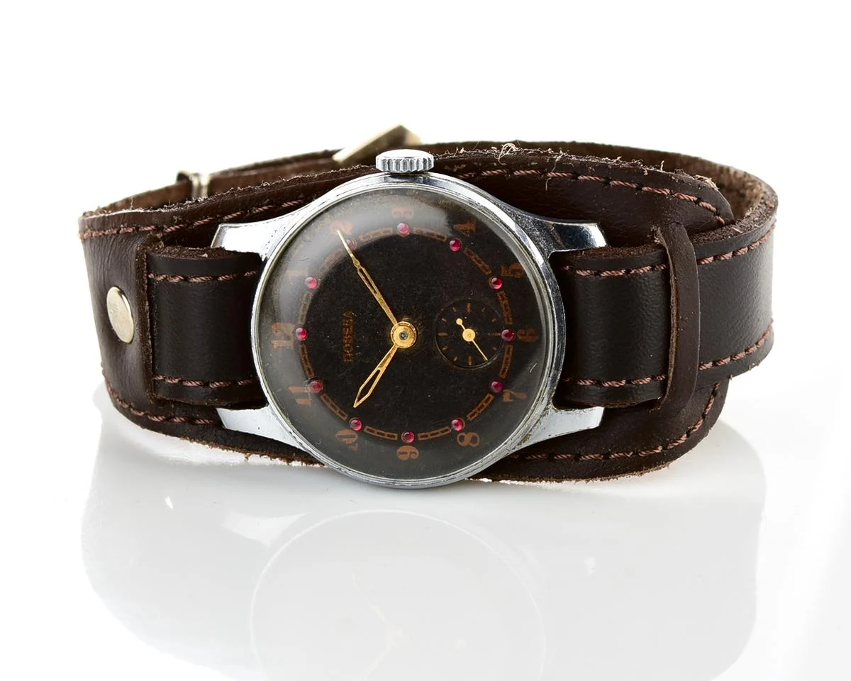 Vintage mechanical Pobeda wrist watch with rubbies on dial