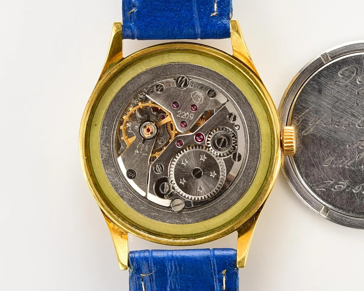 Wostok (Vostok) mechanical gold-plated wrist watch with engraved back