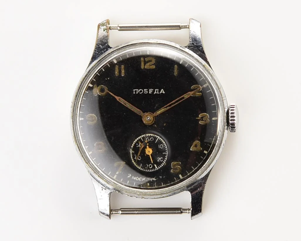 Vintage Soviet mechanical Pobeda wrist watch from 4th quarter 1955
