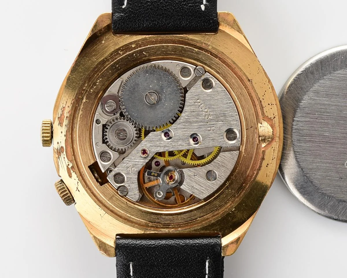 Vintage mechanical gold-plated Raketa watch with 24 hours dial