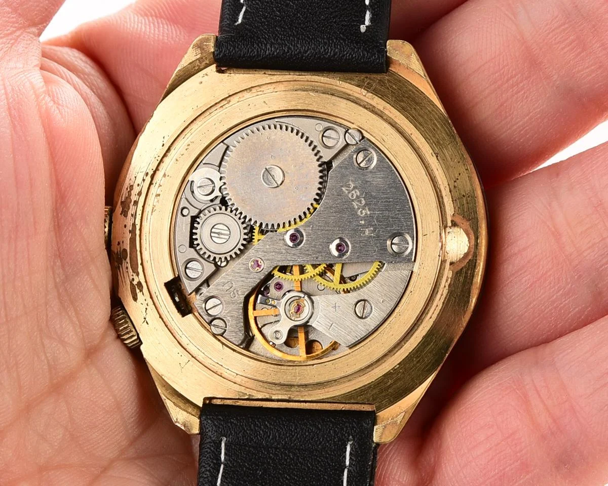 Vintage mechanical gold-plated Raketa watch with 24 hours dial