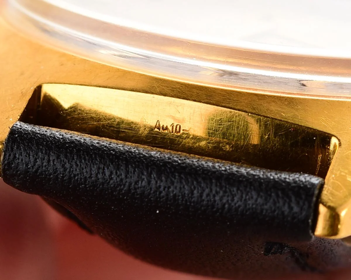 Luch vintage Soviet gold-plated watch with intricate dial